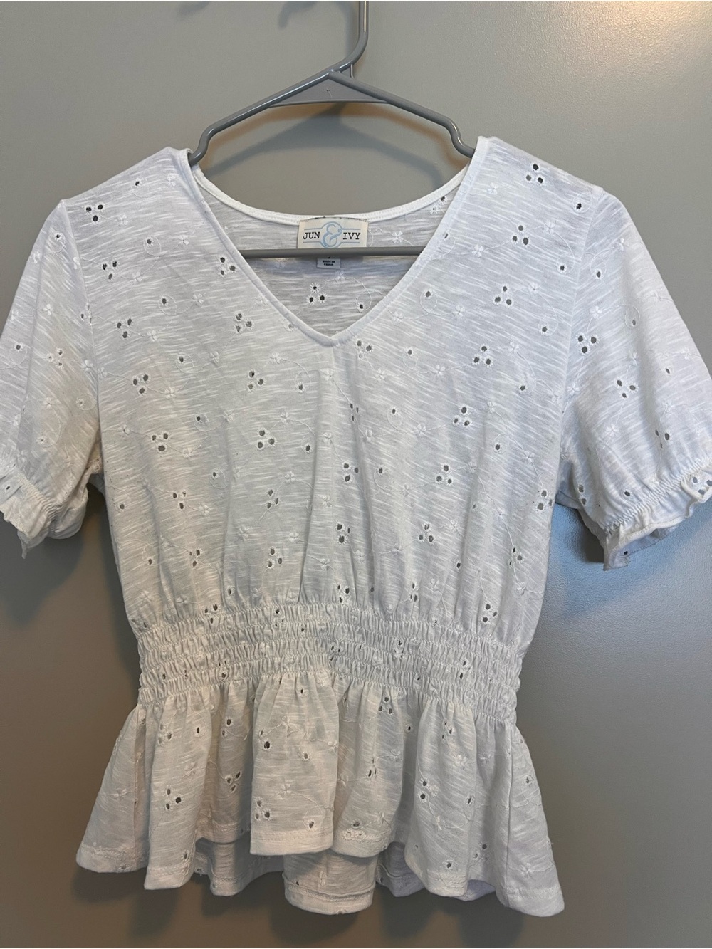 White Eyelet V-Neck Peplum Blouse